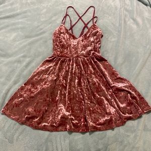 Festive crushed velvet low cross back skater dress